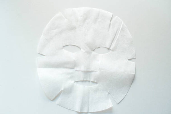 Face mask for facial skincare and treatments on white background