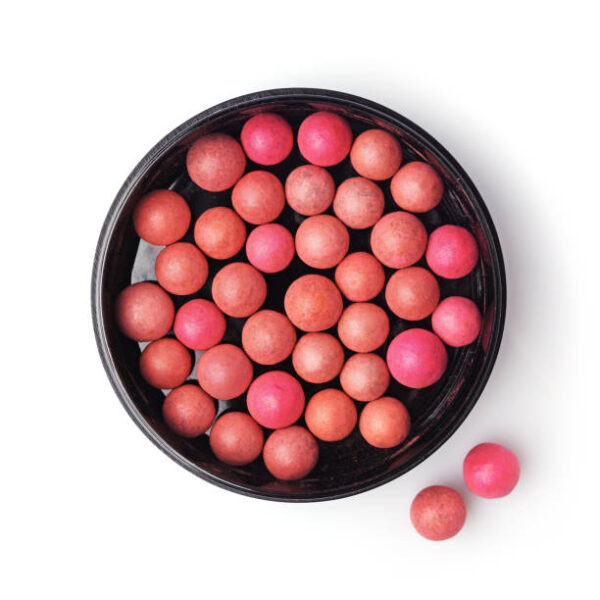Pink and beige blush balls isolated on white background