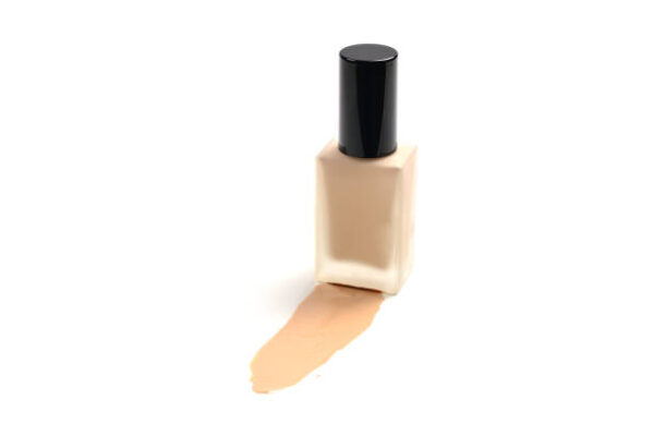 Bottle with makeup liquid foundation isolated on white background